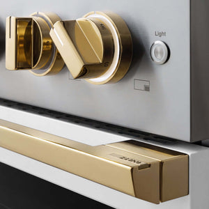 ZLINE Autograph Edition 48 in. 6.7 cu. ft. Marino Double Oven Gas Range with 8 Burner Cooktop in Stainless Steel with White Matte Doors and Polished Gold Accents (MGRZ-WM-48-G) close-up, oven and cooktop knobs.