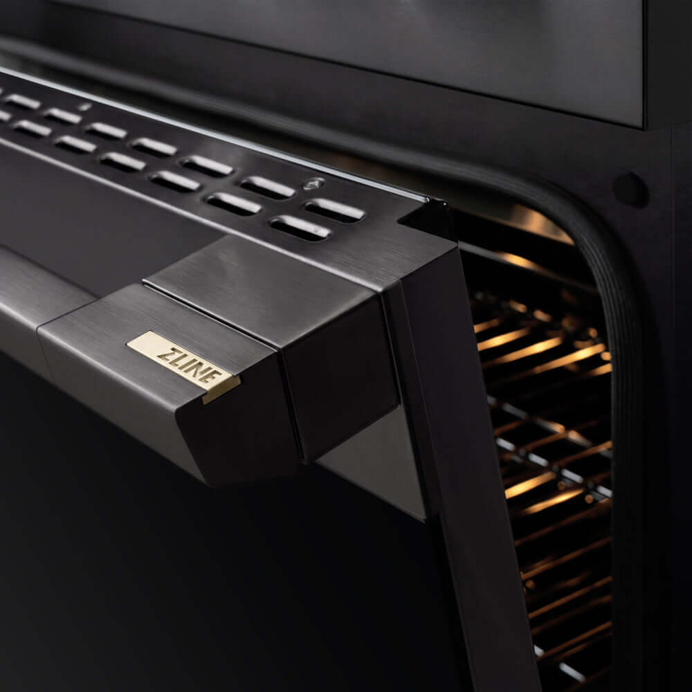 ZLINE 36 in. 5.2 cu. ft. Marino Induction Range with 5 Element Cooktop and Electric Convection Oven in Black Stainless Steel (MINRB-36) close-up, oven door handle.