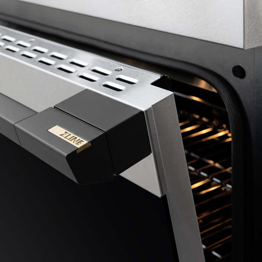 ZLINE Autograph Edition 36 in. 5.2 cu. ft. Marino Induction Range with 5 Element Cooktop and Electric Convection Oven in Satin Stainless Steel with Matte Black Accents (MINRSZ-36-MB) close-up, oven door handle.