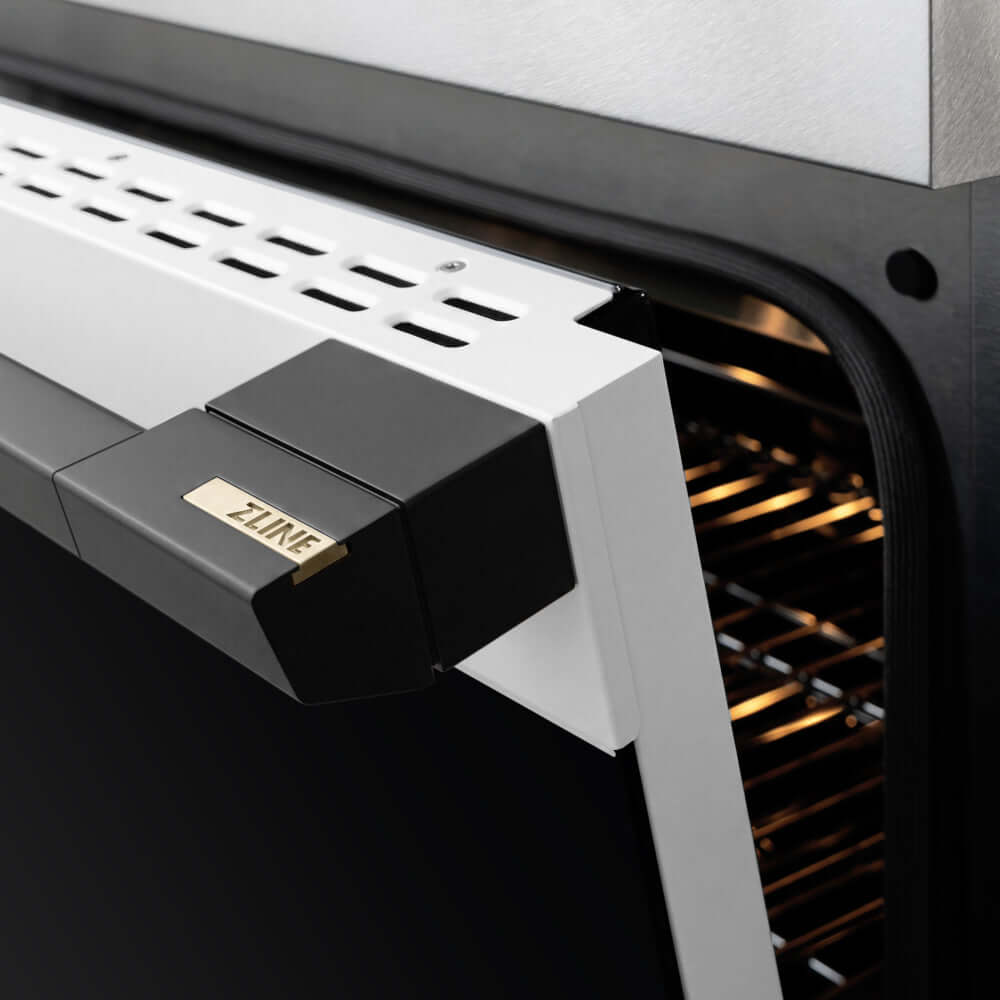 ZLINE Autograph Edition 30 in. 4.2 cu. ft. Marino Induction Range with 4 Element Cooktop and Electric Convection Oven in Satin Stainless Steel with White Matte Door and Matte Black Accents (MINRSZ-WM-30-MB) close-up, oven door handle.
