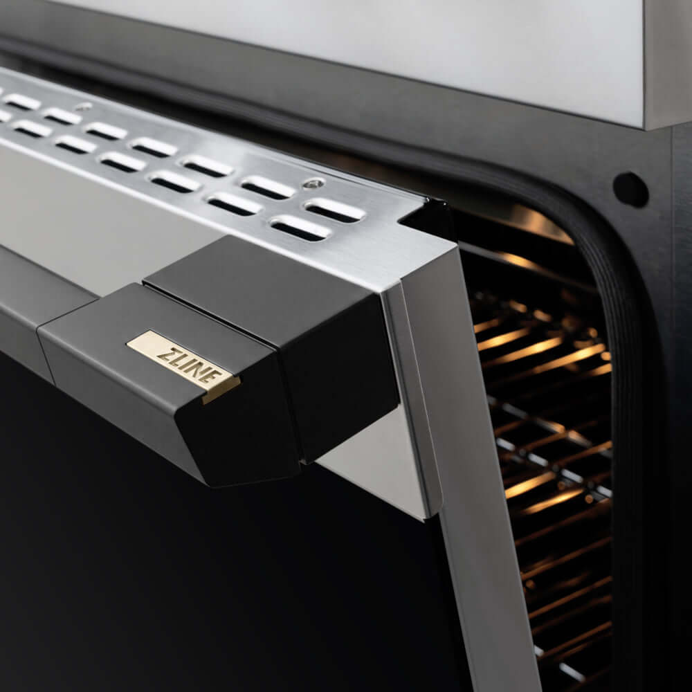 ZLINE Autograph Edition 36 in. 5.2 cu. ft. Marino Induction Range with 5 Element Cooktop and Electric Convection Oven in Stainless Steel with Matte Black Accents (MINRZ-36-MB) close-up, oven door handle.