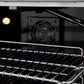 ZLINE 36 in. 5.2 cu. ft. Paramount Gas Range with Convection Gas Oven in Satin Stainless Steel with 6 Brass Burners (SGRS-BR-36) convection fan and lighting inside oven.