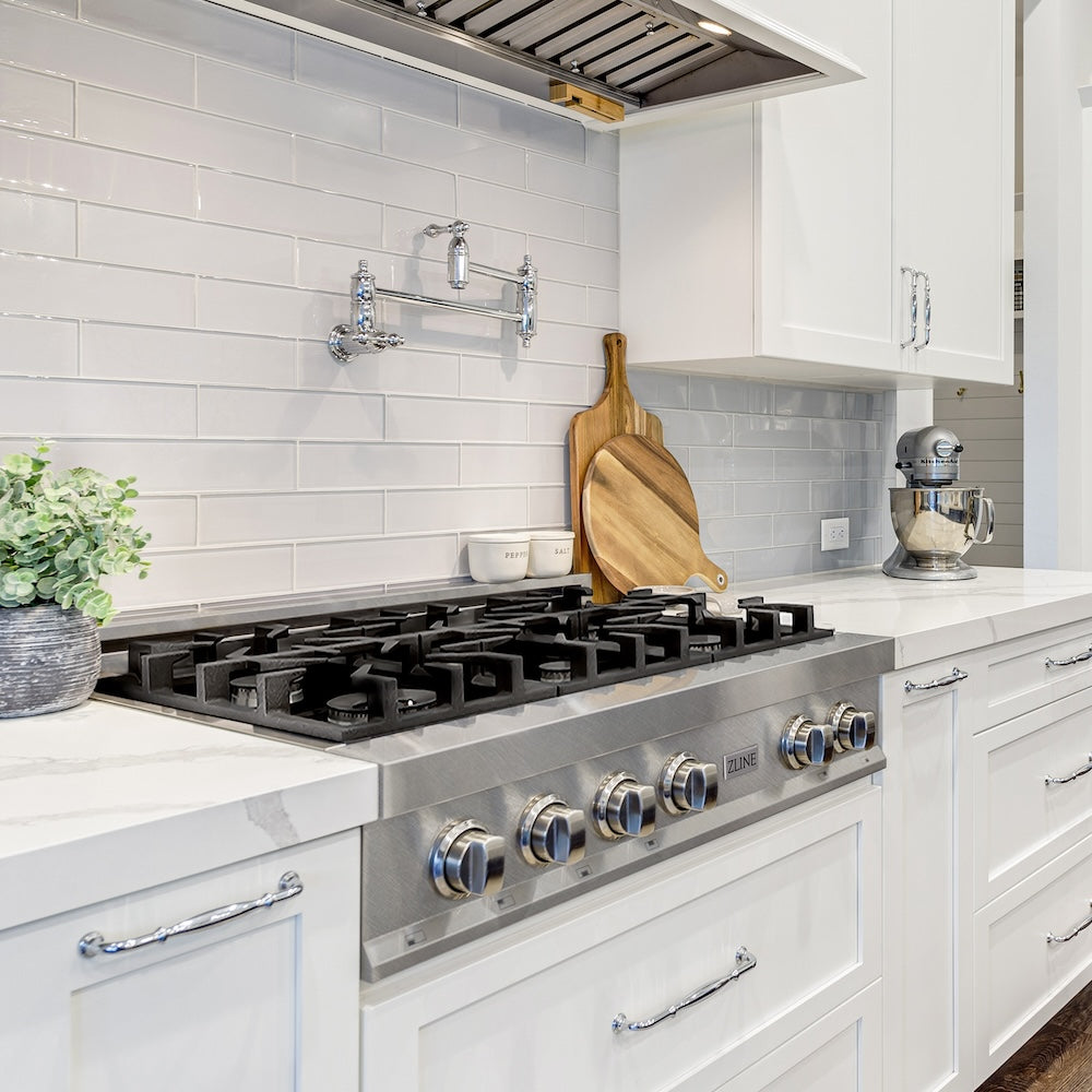 ZLINE 36 in. Legacy Gas Rangetop with 6 Burners and Porcelain Cooktop in Satin Stainless Steel (RTS-36) in a modern kitchen with white cabinets