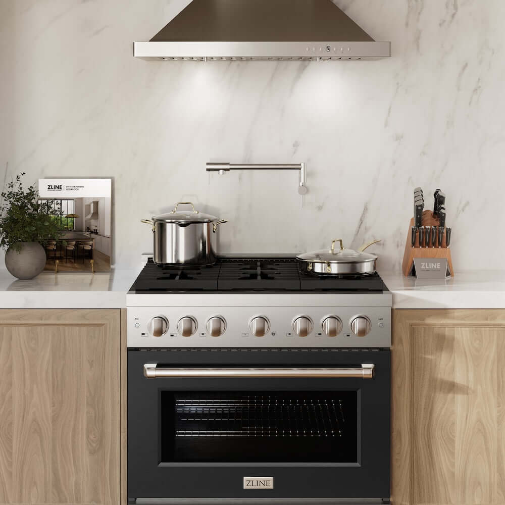 ZLINE 36 in. 5.2 cu. ft. Paramount Dual Fuel Range with 6 Burner Gas Cooktop and Electric Convection Oven in Stainless Steel with Black Matte Door (SDR-BLM-36) in a luxury kitchen.