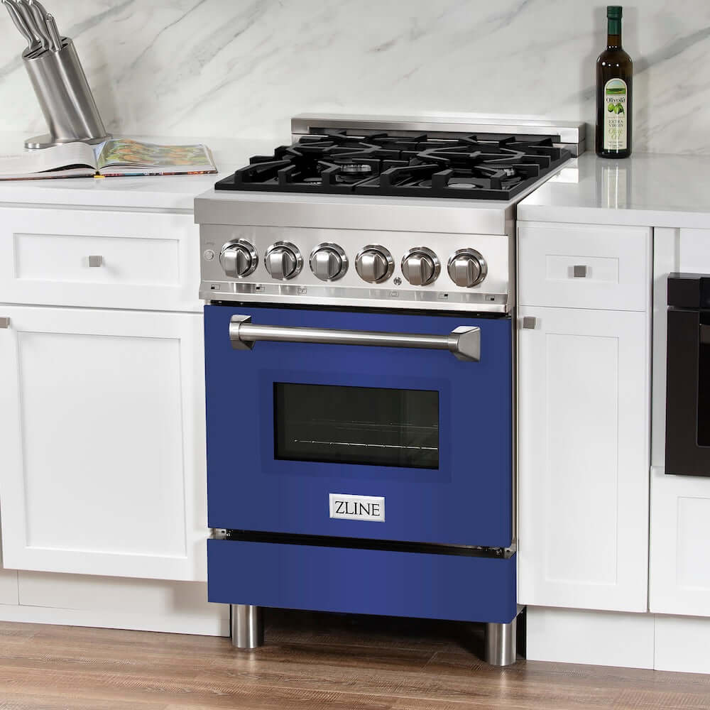 ZLINE 24 in. 2.8 cu. ft. Legacy Dual Fuel Range with 4 Burner Gas Cooktop and Electric Convection Oven in Stainless Steel and Blue Matte Door (RA-BM-24) in a luxury white kitchen.