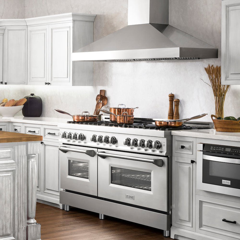 ZLINE 60 in. 7.4 cu. ft. Legacy Dual Fuel Range with Gas Cooktop and 2 Electric Convection Ovens in Stainless Steel with 8 Brass Burners (RA-BR-60) in a luxury kitchen.