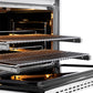ZLINE Autograph Edition 36 in. 5.2 cu. ft. Paramount Gas Range with 6 Burner DuoPro™ Cooktop and Convection Gas Oven with White Matte Door and Matte Black Accents (PSGRZ-WM-36-MB) side, oven open showing racks extended.