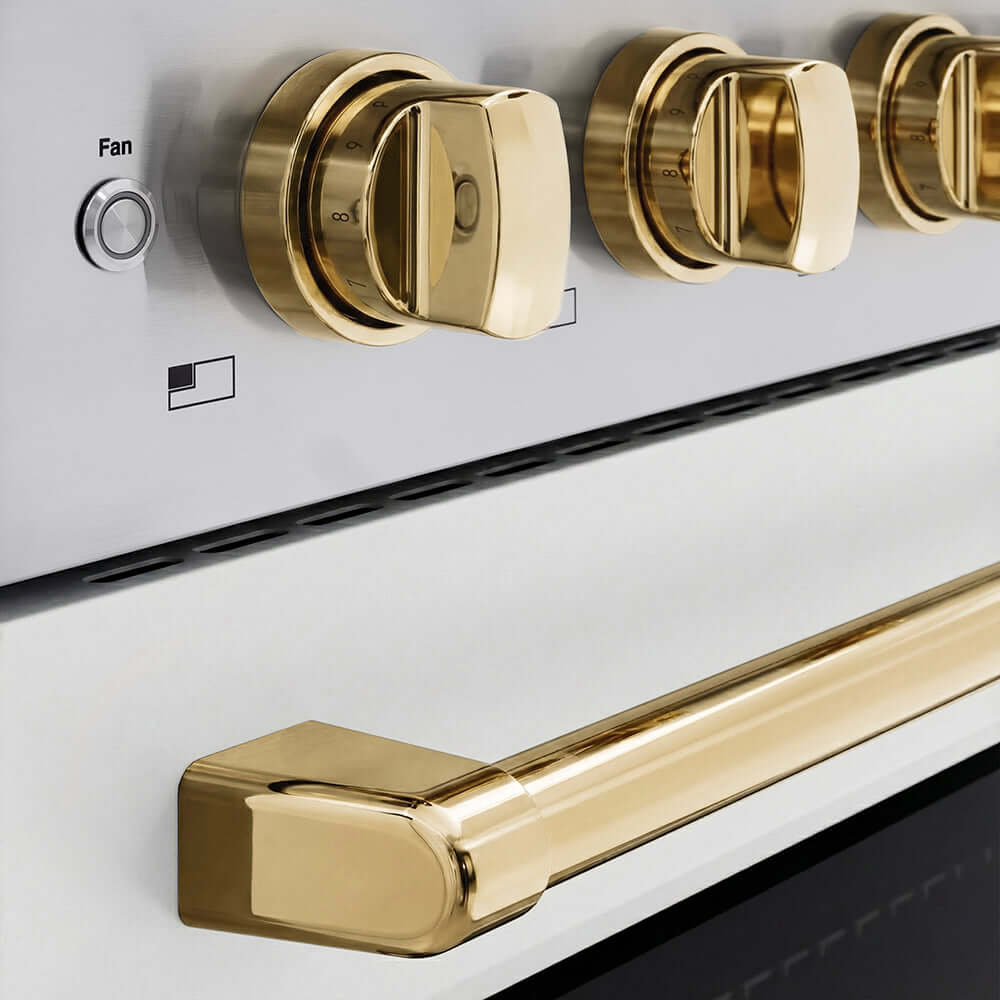 ZLINE Autograph Edition 30 in. 4.2 cu. ft. Paramount Induction Range with 4 Element Cooktop and Electric Convection Oven in Stainless Steel with White Matte Door and Polished Gold Accents (SINRZ-WM-30-G) close-up of oven and cooktop knob controls.