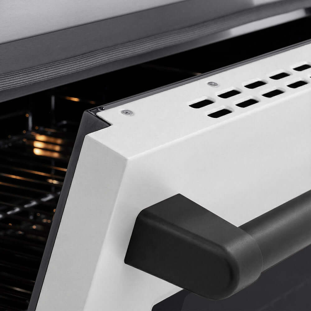 ZLINE Autograph Edition 30 in. 4.2 cu. ft. Paramount Induction Range with 4 Element Cooktop and Electric Convection Oven in Stainless Steel with White Matte Door and Matte Black Accents (SINRZ-WM-30-MB) oven door slightly open showing handle detail.