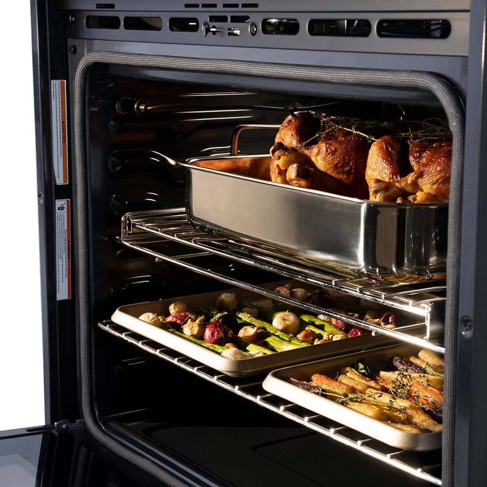 ZLINE oven with poultry on top rack and vegetables on lower rack