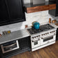 ZLINE 48 in. 6.0 cu. ft. Legacy Dual Fuel Range with 7 Burner Gas Cooktop and 2 Electric Ovens in Stainless Steel and White Matte Doors (RA-WM-48) in a luxury kitchen.