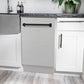 ZLINE Autograph Edition 18 in. Tallac Series 3rd Rack Dishwasher with Auto Door Open Drying, 51dBa, Stainless Steel Panel with Matte Black Handle (DWVZ-304-18-MB) in a modern kitchen with white cabinets and a gray countertop.