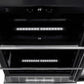 ZLINE Autograph Edition 24 in. Monument 154 Can Beverage Fridge in Stainless Steel with Matte Black Accents (RBVZ-US-24-MB) close-up, adjustable glass shelving and display from above.