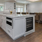 ZLINE Autograph Edition 24 in. Monument 154 Can Beverage Fridge in Stainless Steel with Matte Black Accents (RBVZ-US-24-MB) built-in to farmhouse kitchen island with marble countertop.