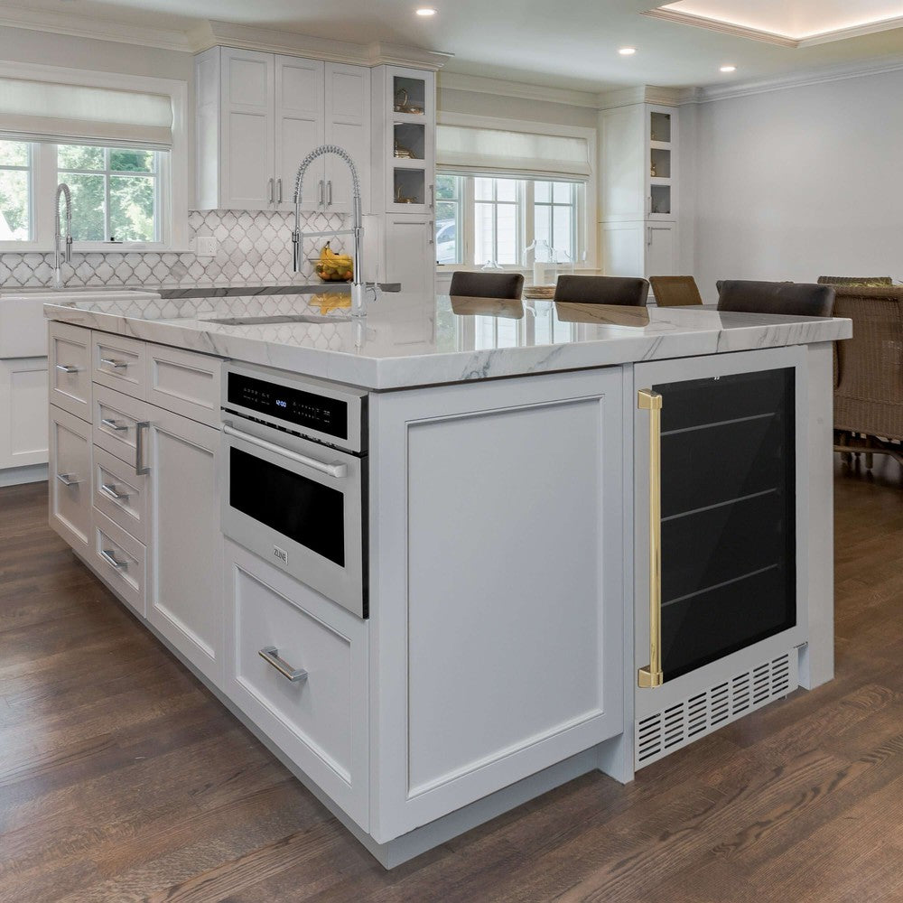 ZLINE Autograph Edition 24 in. Monument 154 Can Beverage Fridge in Stainless Steel with Polished Gold Accents (RBVZ-US-24-G) built-in to farmhouse kitchen island with marble countertop.