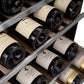 ZLINE Autograph Edition 24 in. Monument Dual Zone 44-Bottle Wine Cooler in Stainless Steel with Polished Gold Accents (RWVZ-UD-24-G) close-up, racks of red and white wine bottles stored on adjustable wood shelves.