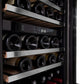ZLINE Autograph Edition 24 in. Monument Dual Zone 44-Bottle Wine Cooler in Stainless Steel with Matte Black Accents (RWVZ-UD-24-MB) close-up, racks of red and white wine bottles stored on adjustable wood shelves.