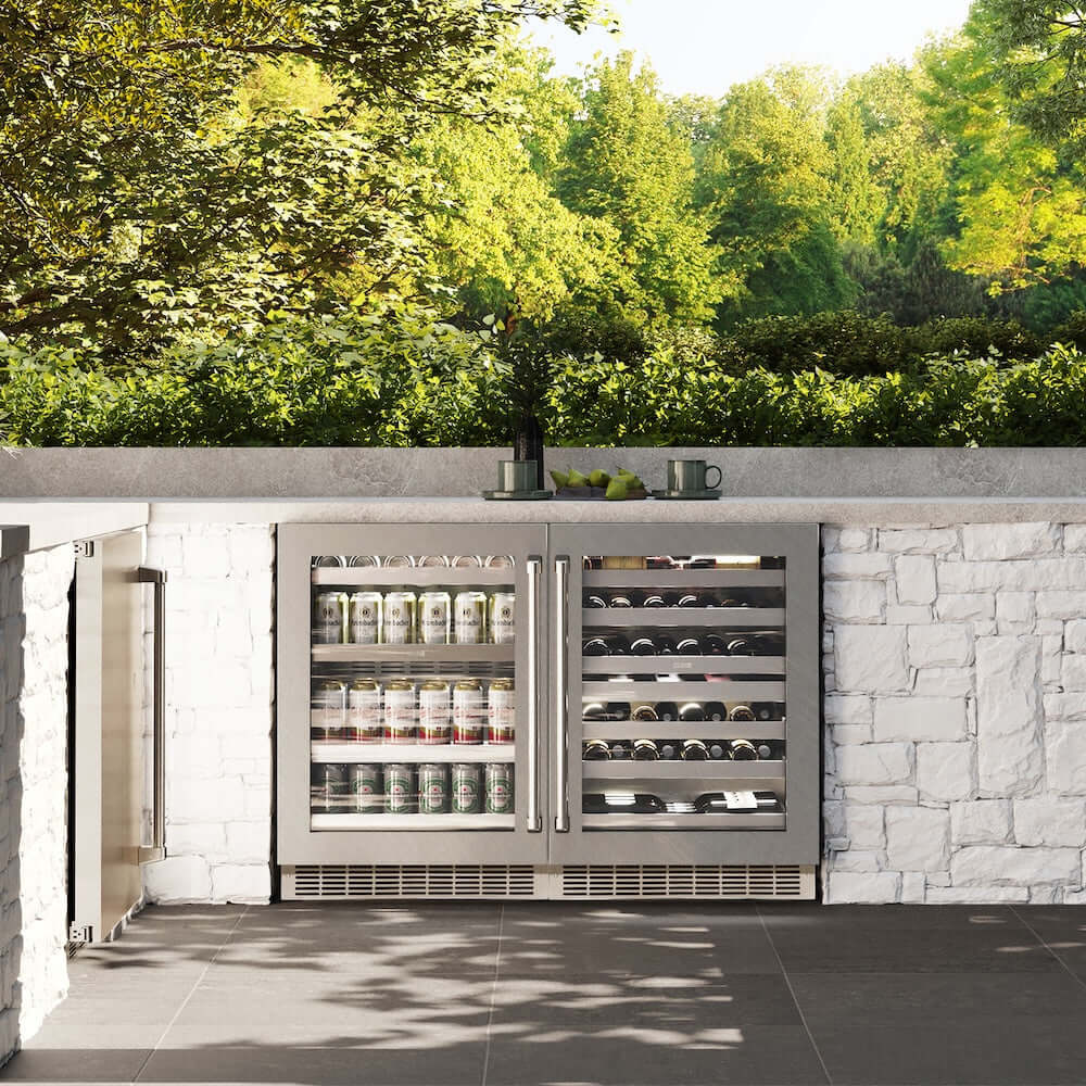 ZLINE 24 in. Touchstone 151 Can Beverage Fridge With DuraSnow® Stainless Steel Glass Door (RBSO-SN-24) in a luxury outdoor kitchen, front.