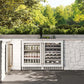 ZLINE 24 in. Touchstone 151 Can Beverage Fridge With White Matte Glass Door (RBSO-WM-24) front, in an outdoor patio area with a matching wine cooler against a stone wall and greenery.
