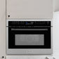 ZLINE Autograph Edition 24 in. 1.6 cu ft. Built-in Convection Microwave Oven in Satin Stainless Steel with Matte Black Accents (MWOZ-24-SS-MB) in a kitchen setting