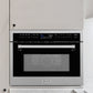 ZLINE 24 in. 1.6 cu ft. Built-in Convection Microwave Oven in Satin Stainless Steel with Speed and Sensor Cooking (MWO-24-SS) in a kitchen setting