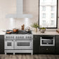 ZLINE Convertible Vent Wall Mount Range Hood in Stainless Steel (KE) above a large range in modern kitchen