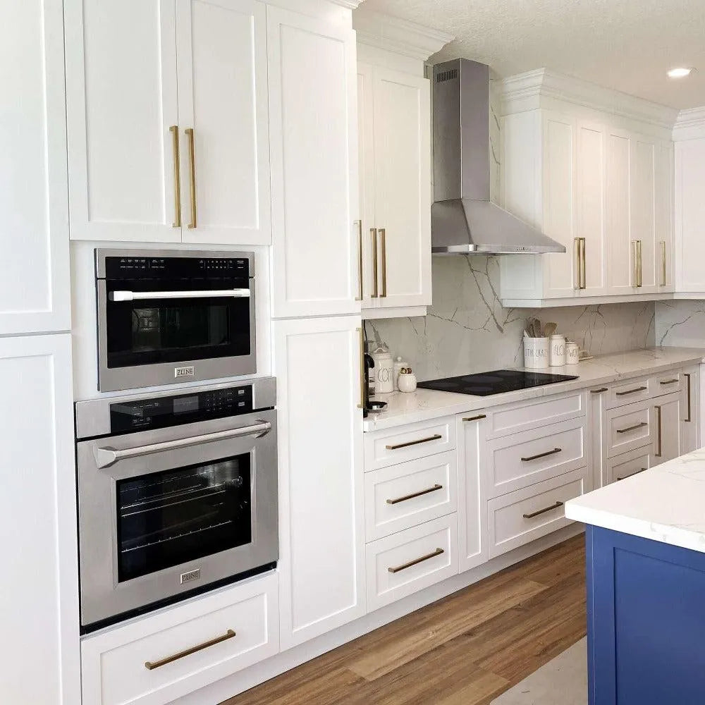 ZLINE 24 in. Stainless Steel Built-in Convection Microwave Oven with Speed and Sensor Cooking (MWO-24) installed above a wall oven in a luxury farmhouse kitchen, side.