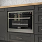 ZLINE 24 in. Stainless Steel Built-in Convection Microwave Oven with Speed and Sensor Cooking (MWO-24) built-in to black cabinets with wood countertops.