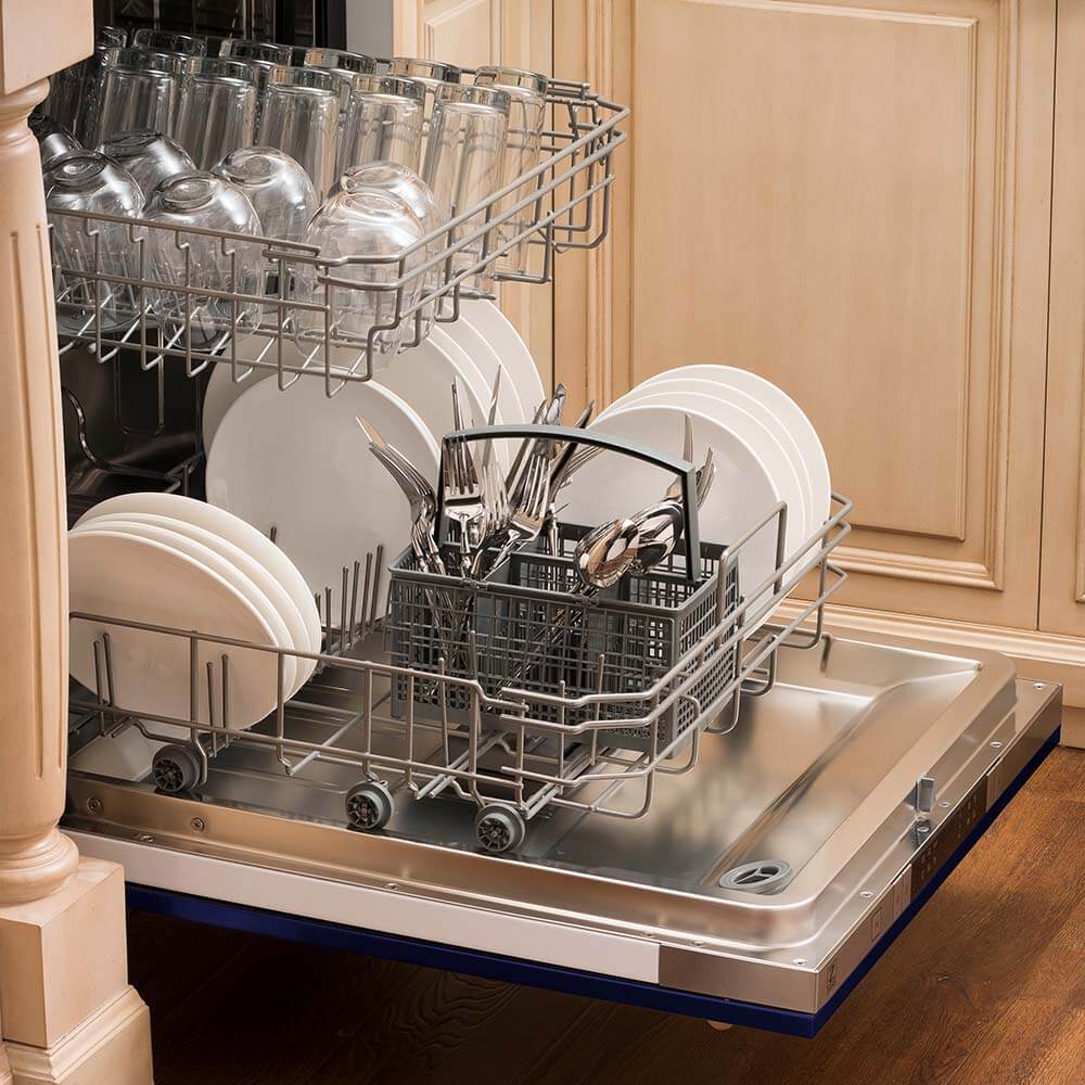 ZLINE 24 in. Blue Gloss Top Control Built-In Dishwasher with Stainless Steel Tub and Traditional Style Handle, 52dBa (DW-BG-24) open, with dishes loaded in a rustic-themed kitchen from side.