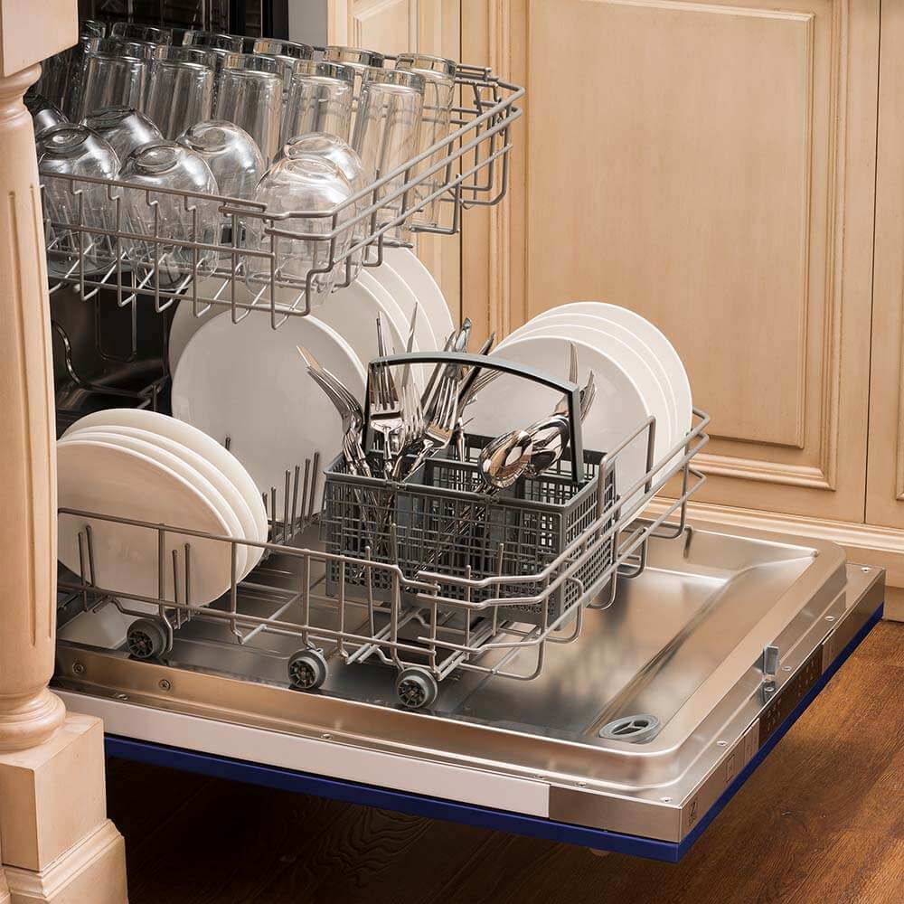 ZLINE 24 in. Blue Matte Top Control Built-In Dishwasher with Stainless Steel Tub and Traditional Style Handle, 52dBa (DW-BM-24) open, with dishes loaded in a rustic-themed kitchen from side.