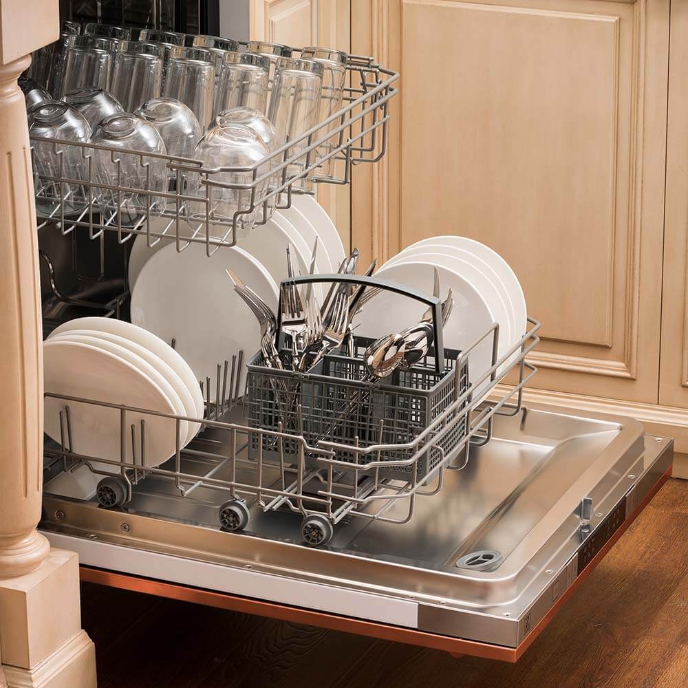 ZLINE 24 in. Copper Top Control Built-In Dishwasher with Stainless Steel Tub and Traditional Style Handle, 52dBa (DW-C-H-24) open, with dishes loaded in a rustic-themed kitchen from side.
