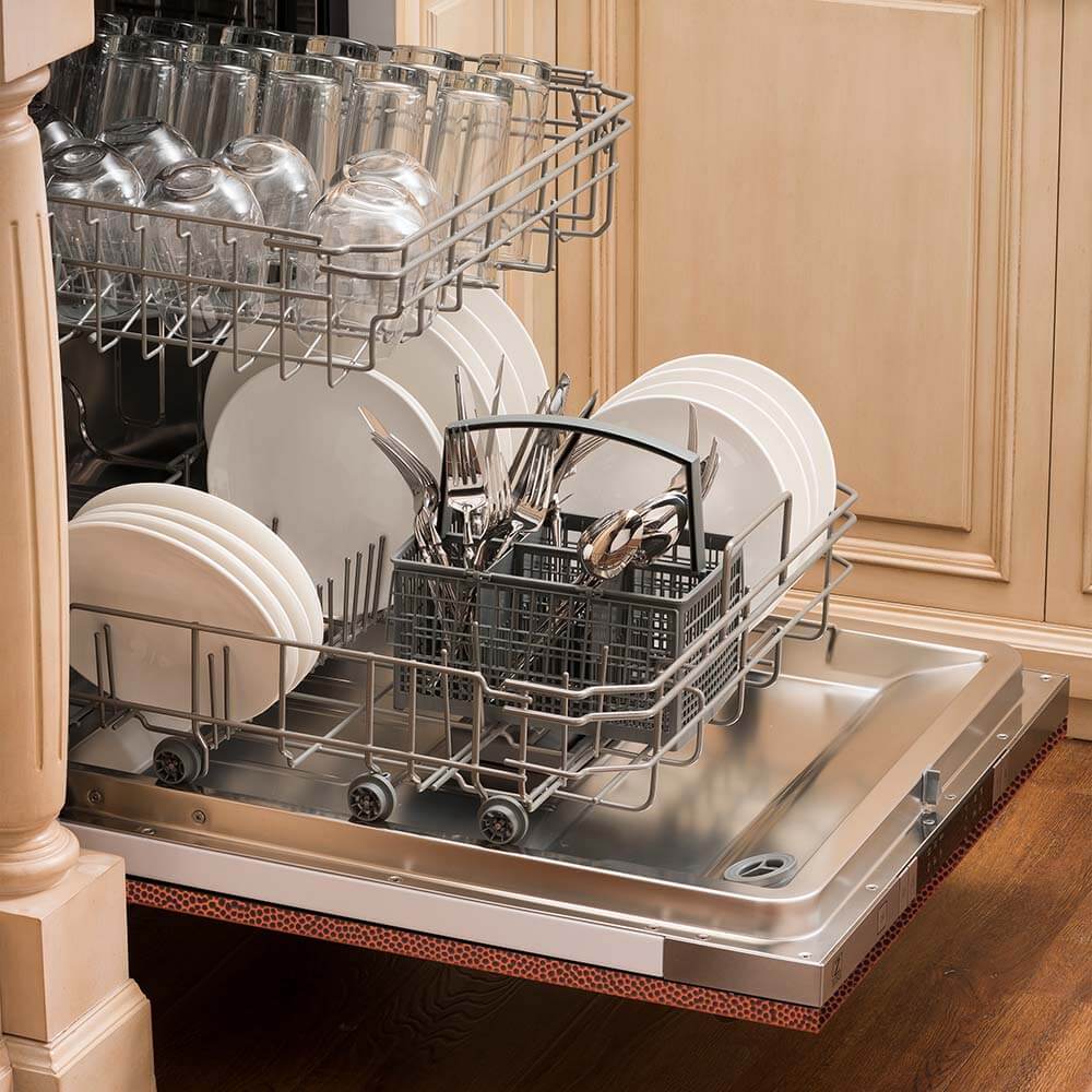 ZLINE 24 in. Hand-Hammered Copper Top Control Built-In Dishwasher with Stainless Steel Tub and Traditional Style Handle, 52dBa (DW-HH-H-24) open, with dishes loaded in a rustic-themed kitchen from side.