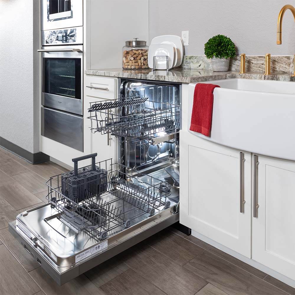 BREDA built-in dishwasher opened in kitchen showroom.