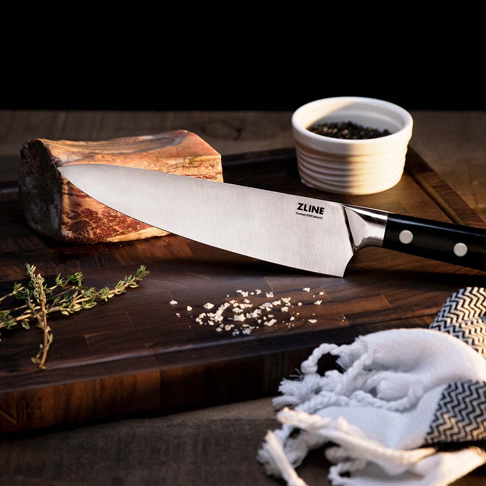 ZLINE German steel chef knife on cutting board