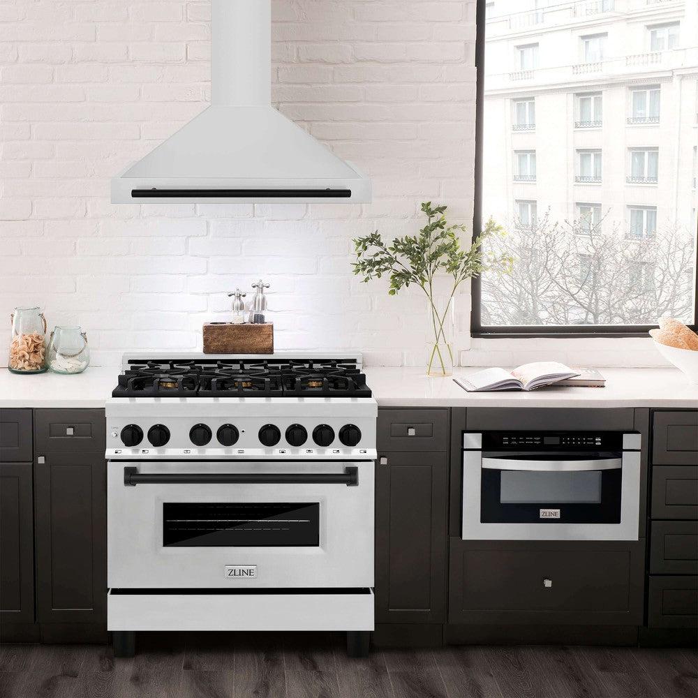 ZLINE Autograph Edition 36 in. Stainless Steel Range Hood with Stainless Steel Shell and Accents (KB4STZ-36) in modern luxury apartment kitchen above matching range.