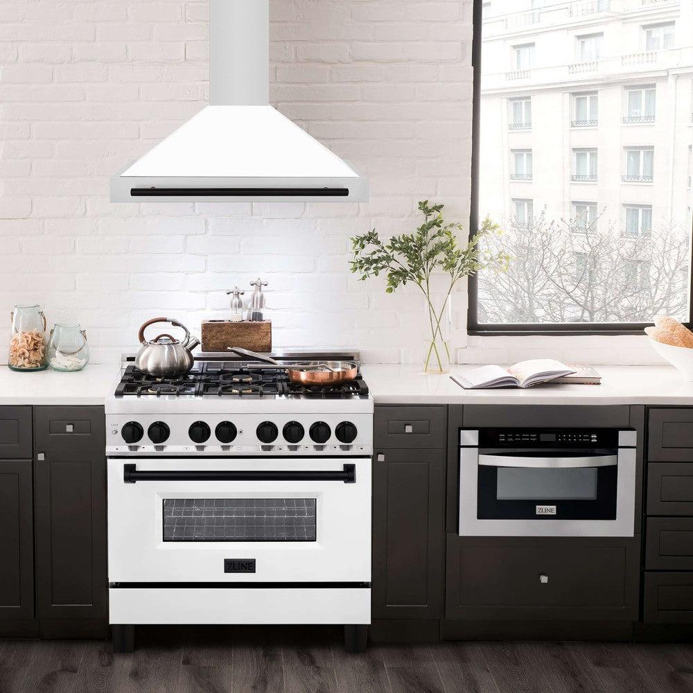 ZLINE Autograph Edition 36 in. Stainless Steel Range Hood with White Matte Shell and Accents (KB4STZ-WM36) in modern luxury apartment kitchen above matching range.