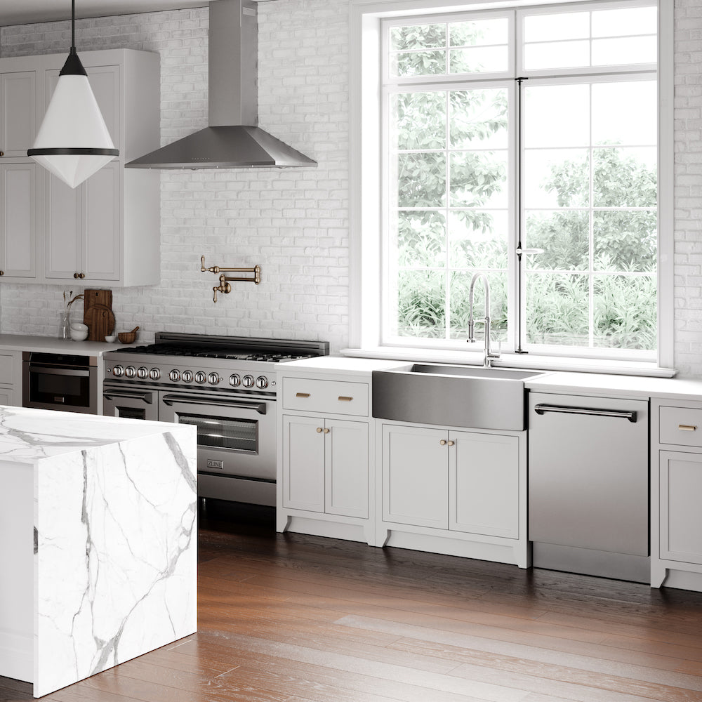ZLINE range, range hood, microwave drawer, dishwasher, pot filler, and farmhouse sink in a wooden and white farmhouse kitchen.