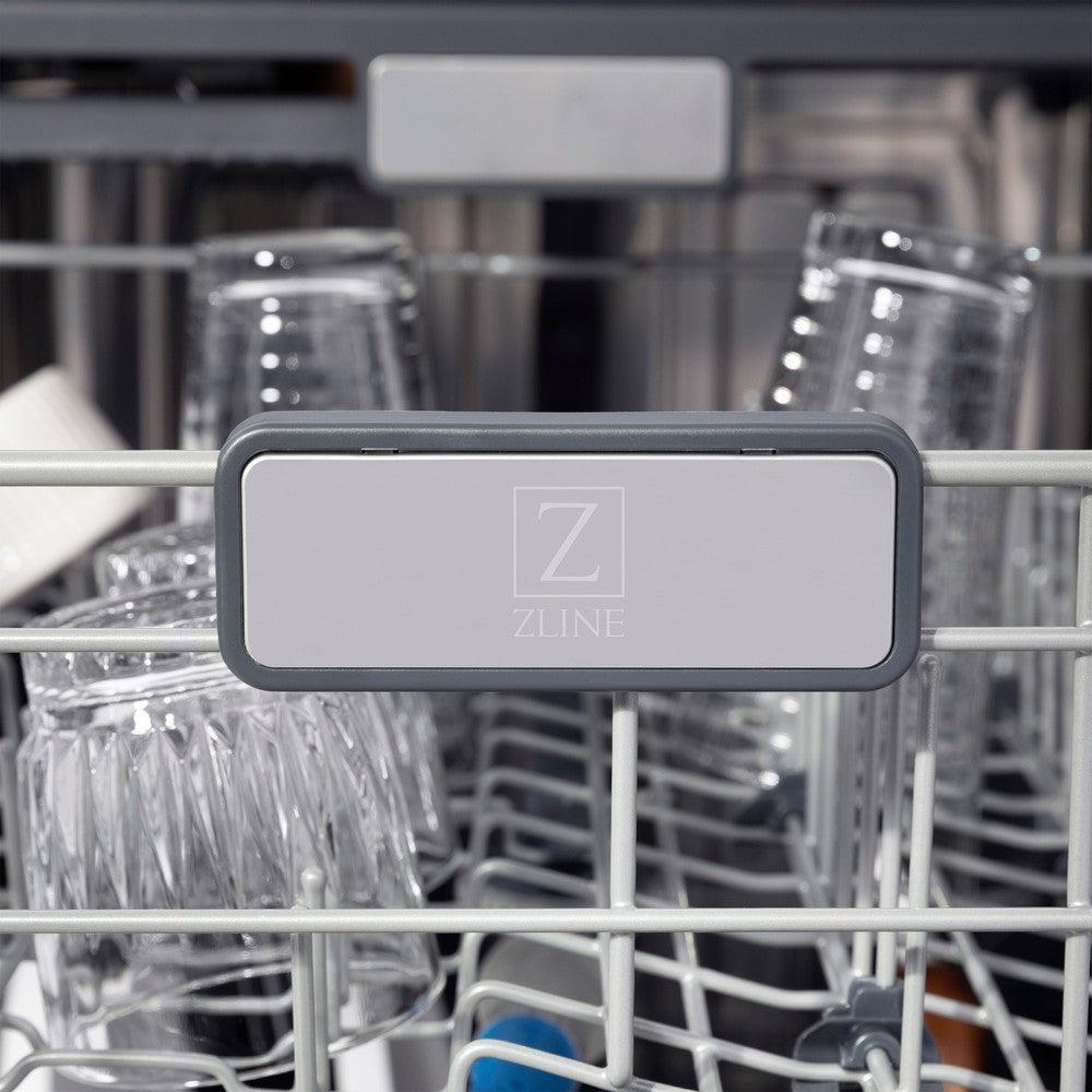 ZLINE Autograph Edition 24 in. Monument Series 3rd Rack Top Touch Control Tall Tub Dishwasher in Black Stainless Steel with Polished Gold Handle, 45dBa (DWMTZ-BS-24-G) ZLINE logo on dish rack.