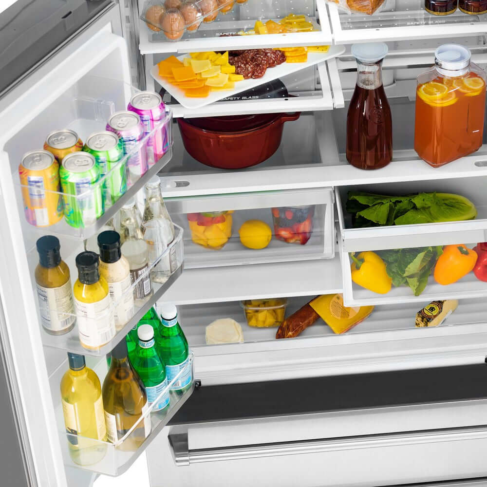 ZLINE 36" French door refrigerator with food and beverages inside on adjustable shelving.