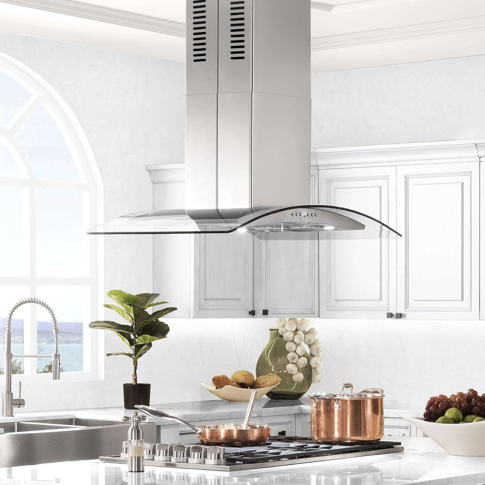 ZLINE Island Mount Range Hood in Stainless Steel & Glass (GL5i) above a cooktop in a farmhouse-style kitchen with white cabinets and copper cookware.