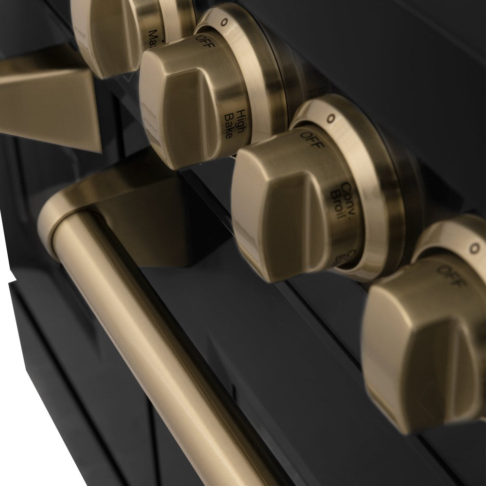 ZLINE Autograph Edition Champagne Bronze range knobs and handle on Black Stainless Steel Range.