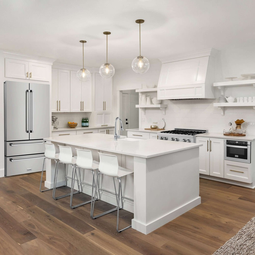 Stainless Steel and Champagne Bronze ZLINE Appliances in Farmhouse Style Kitchen with white cabinets.