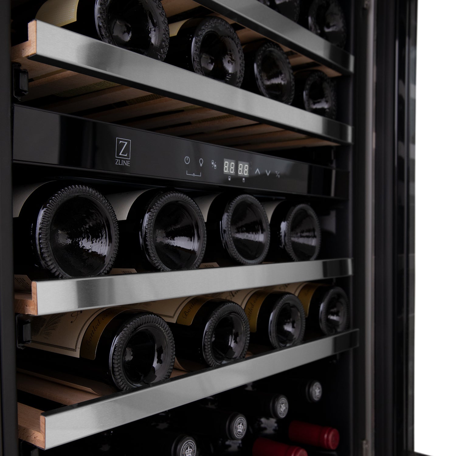 Wine bottles stored inside ZLINE 24" Monument Dual Zone Wine Cooler on adjustable wood shelves.