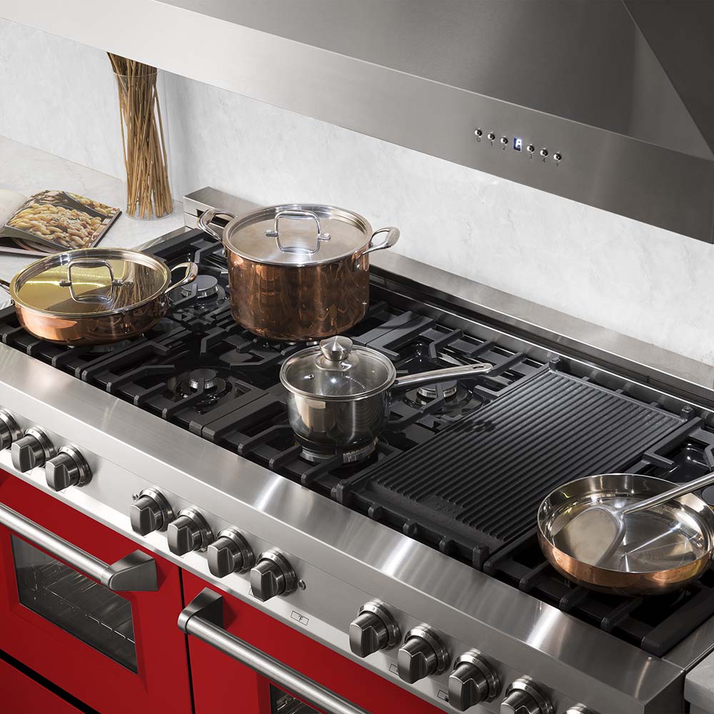 Pots, pans, and griddle on ZLINE 60-inch range with red gloss door
