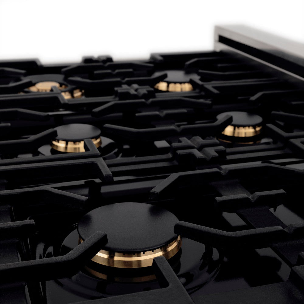 ZLINE brass burners on black porcelain cooktop with cast-iron grates.