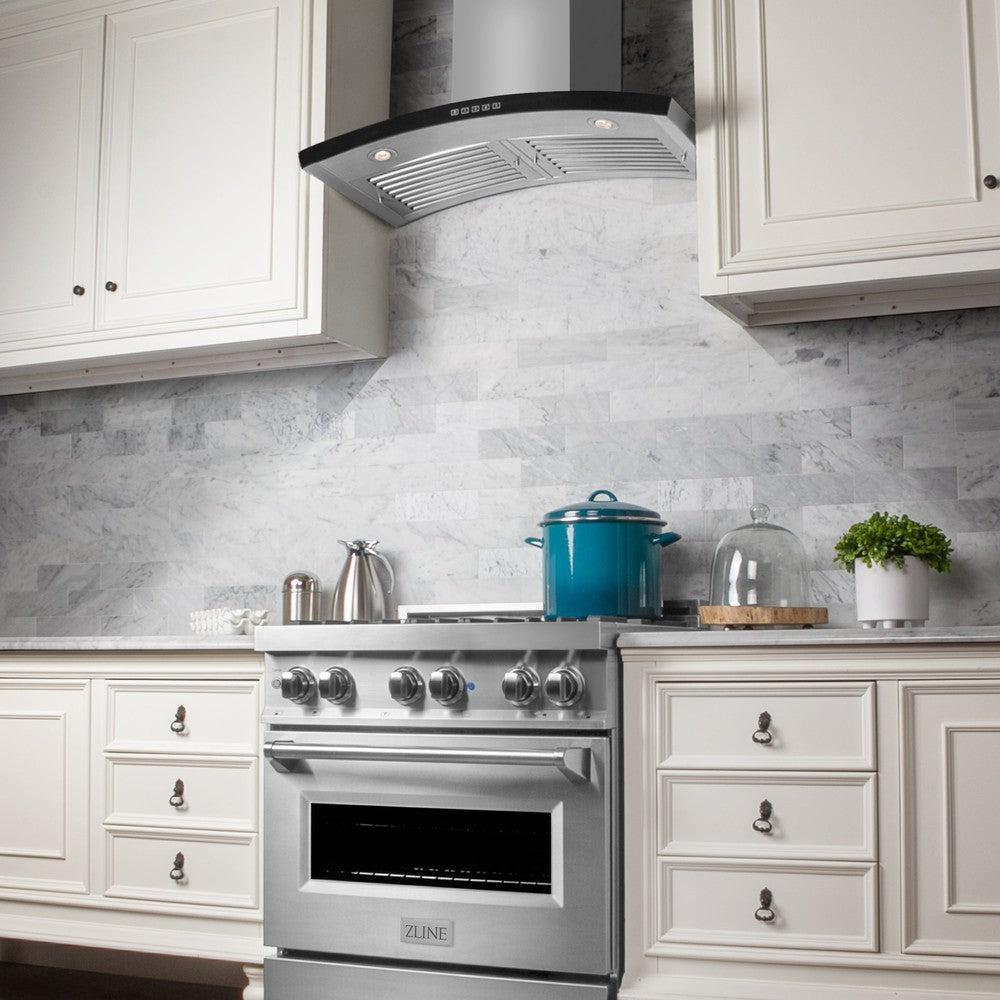 ZLINE Wall Mount Range Hood in Stainless Steel (KN6) in a luxury cottage-style kitchen front.