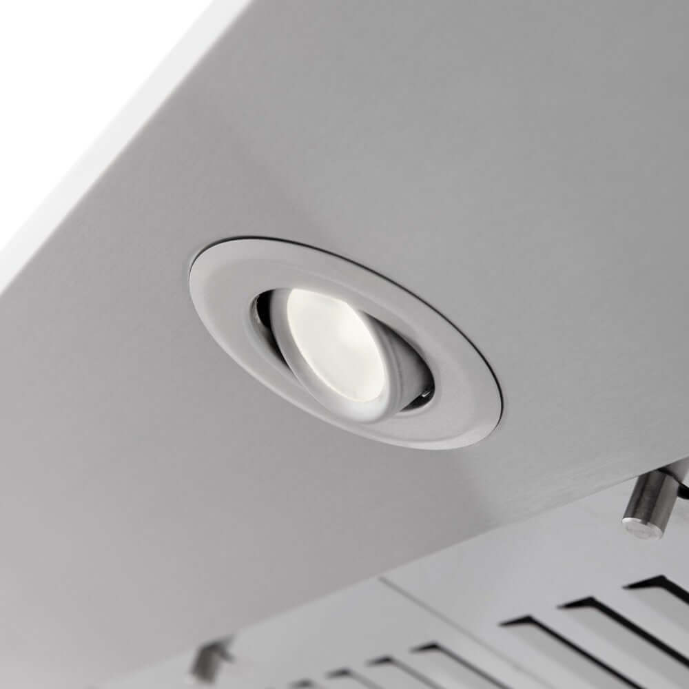 ZLINE Wall Mount Range Hood in Stainless Steel with Built-in ZLINE CrownSound Bluetooth Speakers (KF1CRN-BT) built-in LED light close-up.