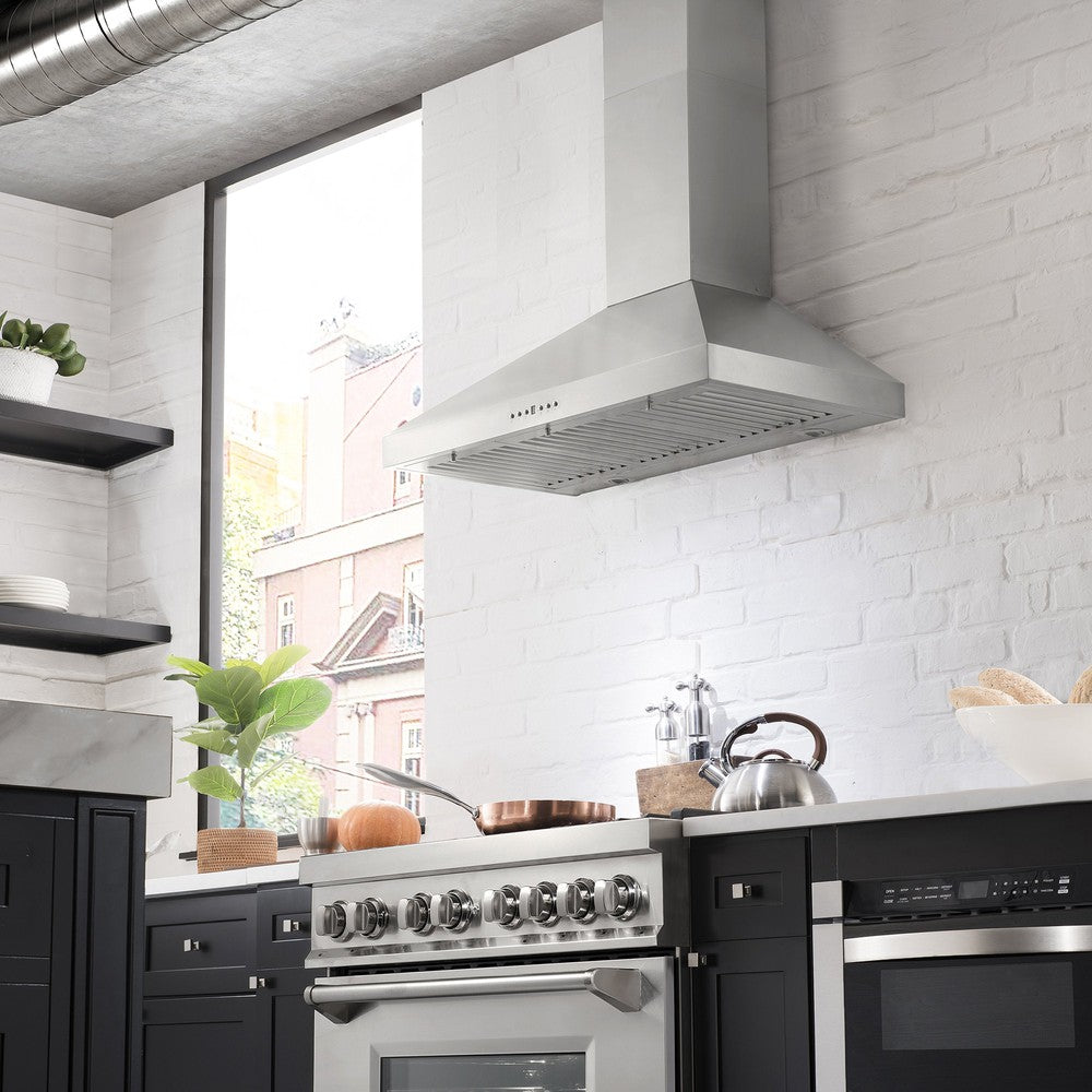 ZLINE Convertible Vent Wall Mount Range Hood in Stainless Steel (KL3) in a modern apartment kitchen.