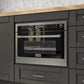 ZLINE 24 in. Stainless Steel Built-in Convection Microwave Oven with Speed and Sensor Cooking (MWO-24) built-in to black cabinets with wood countertops.