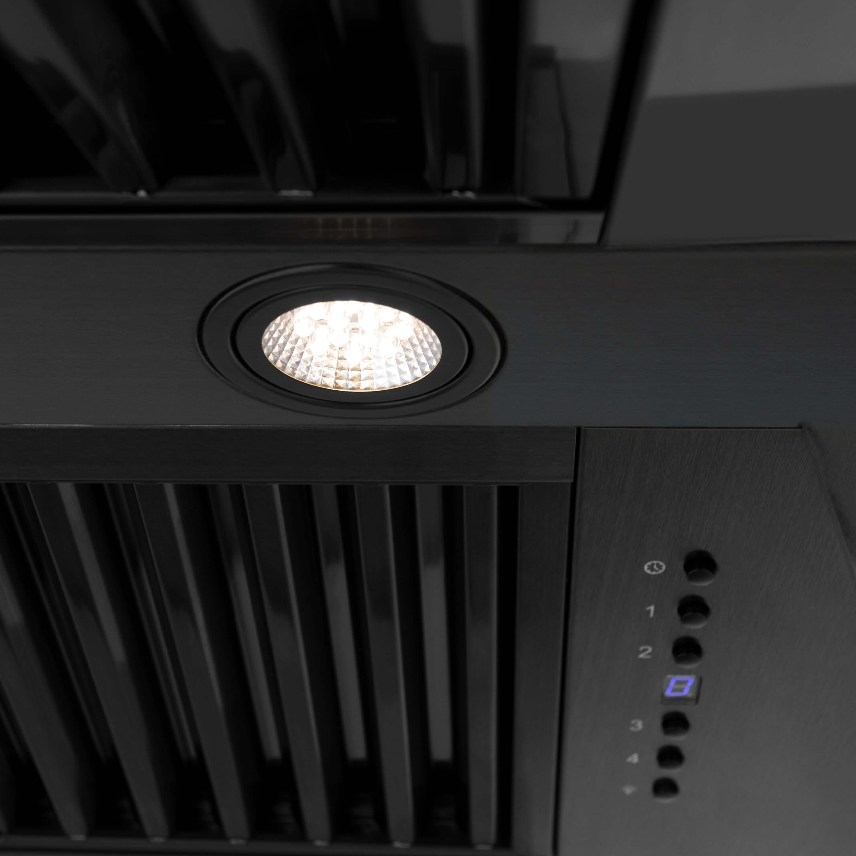 Built-in directional LED lighting on ZLINE black stainless steel range hood.